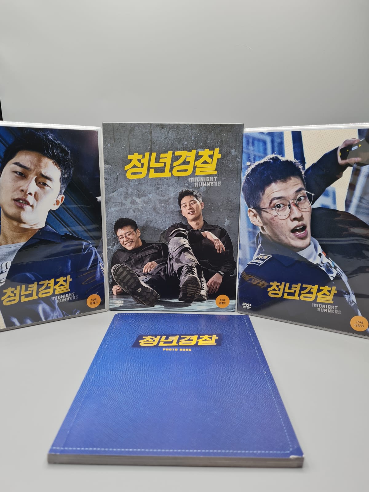 Limited edition Korean drama DVD box sets on a shelf display for collectors