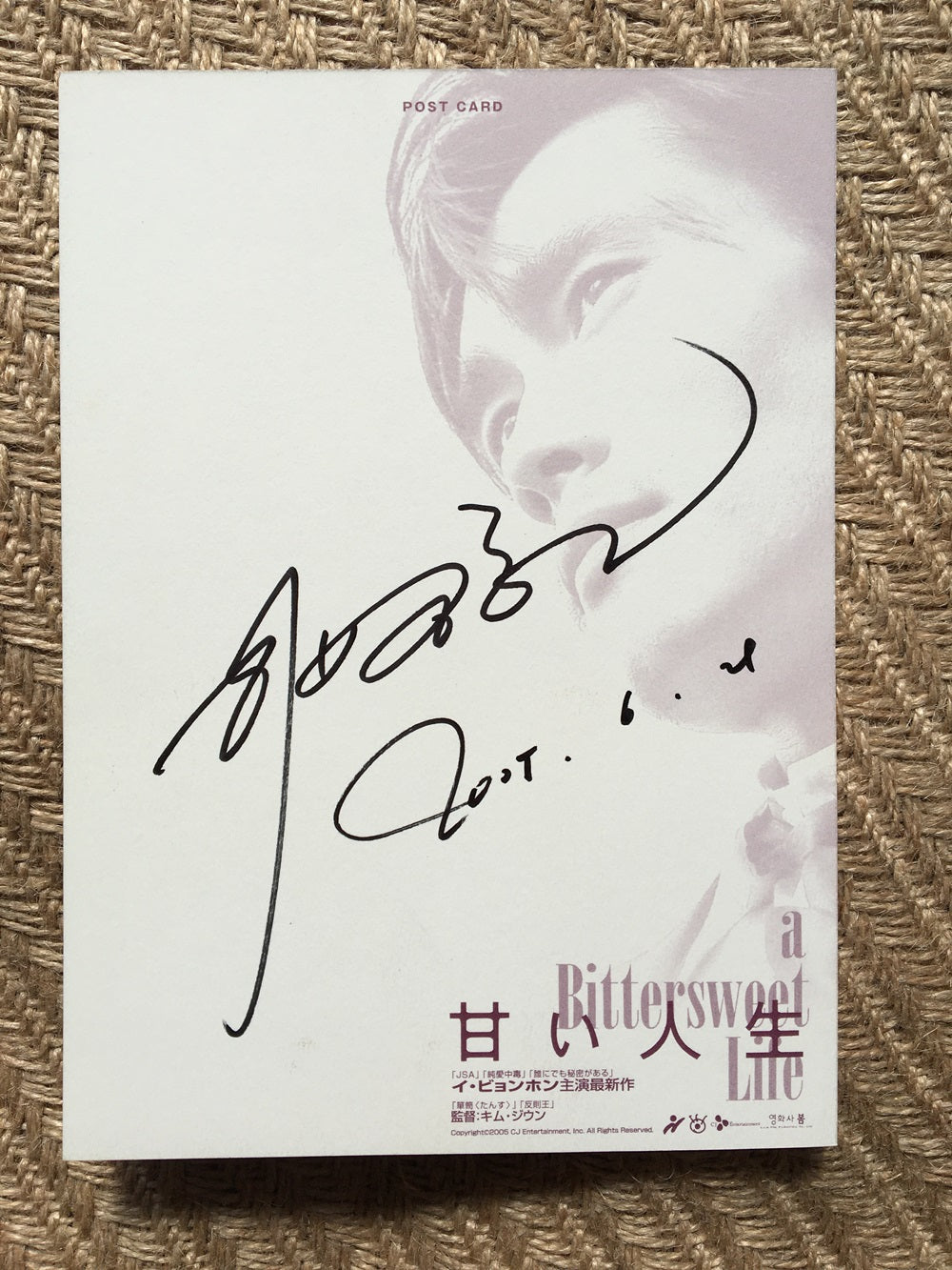 Signed photocard of Lee Byung Hun from A Bittersweet Life